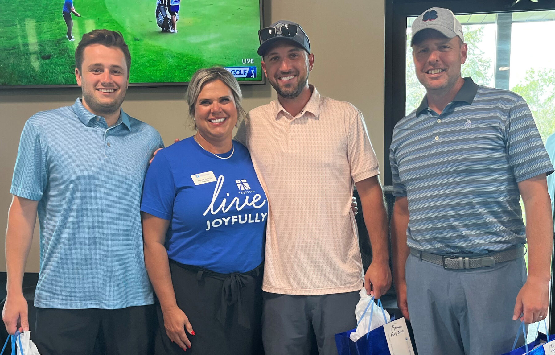 Christie Hinrichs with winning Westgate Bank team